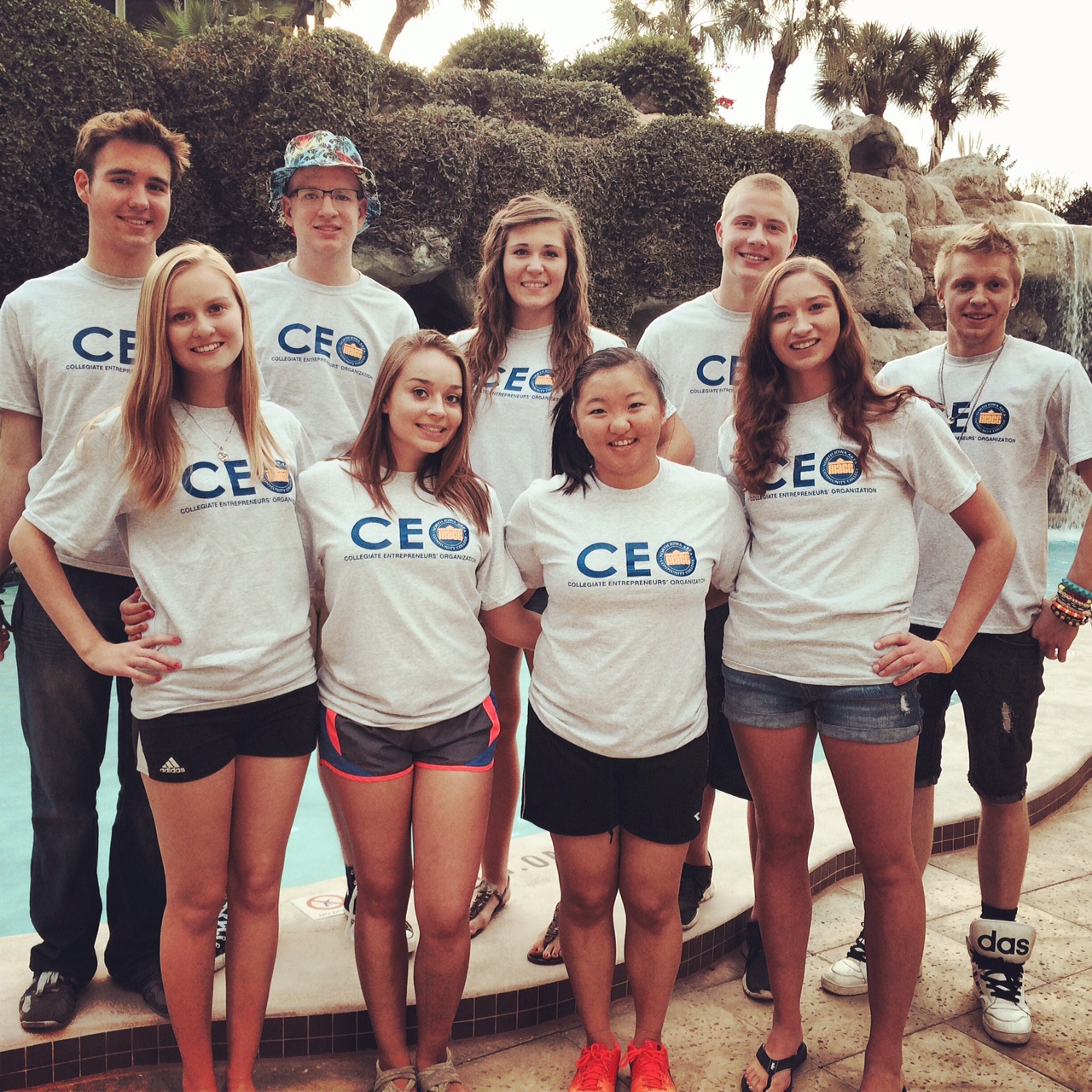 NOVA students wearing CEO shirts and posing together