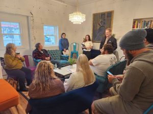 NOVA students meeting with a local business owner.