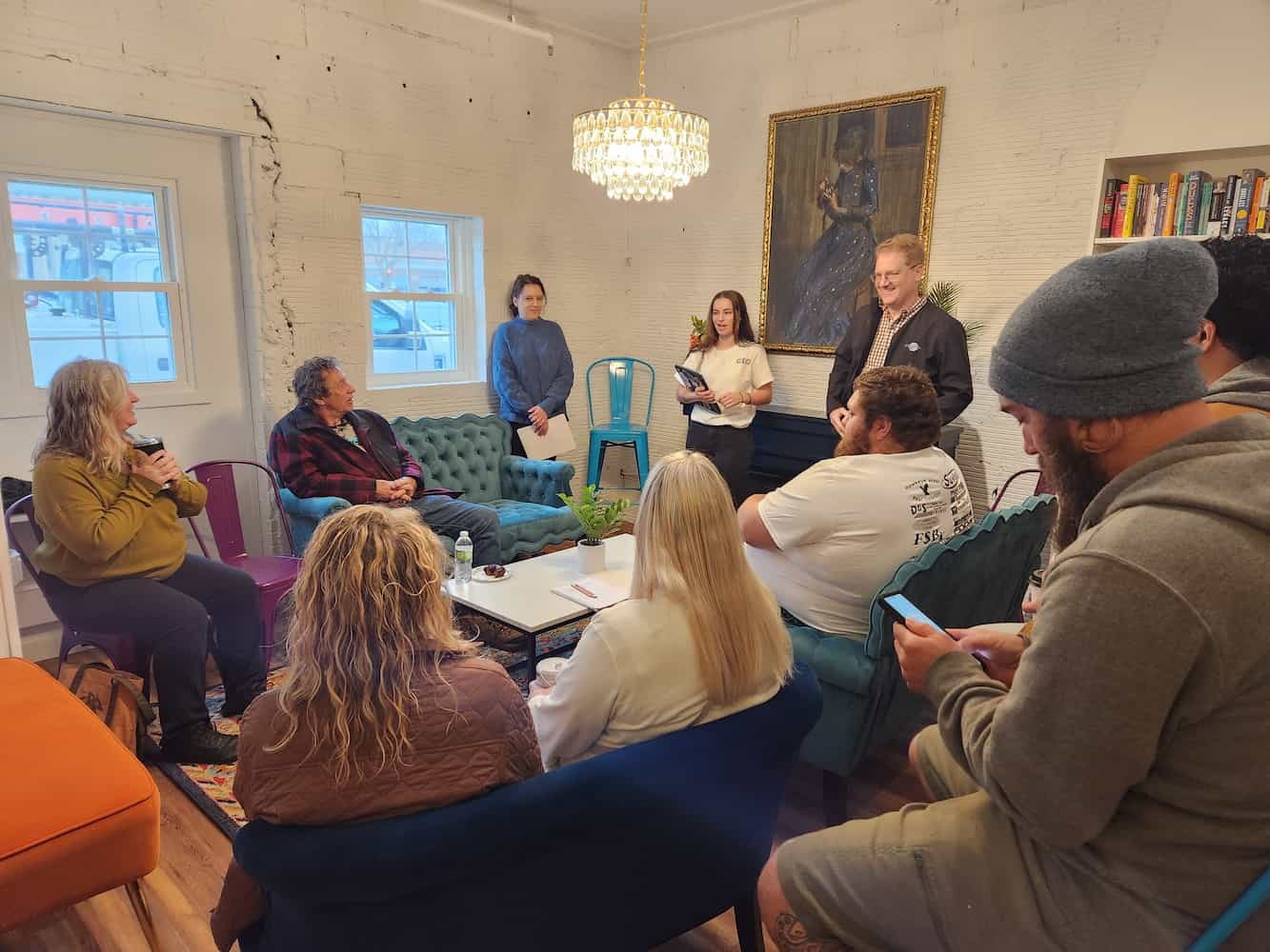 NOVA students meeting with a local business owner.