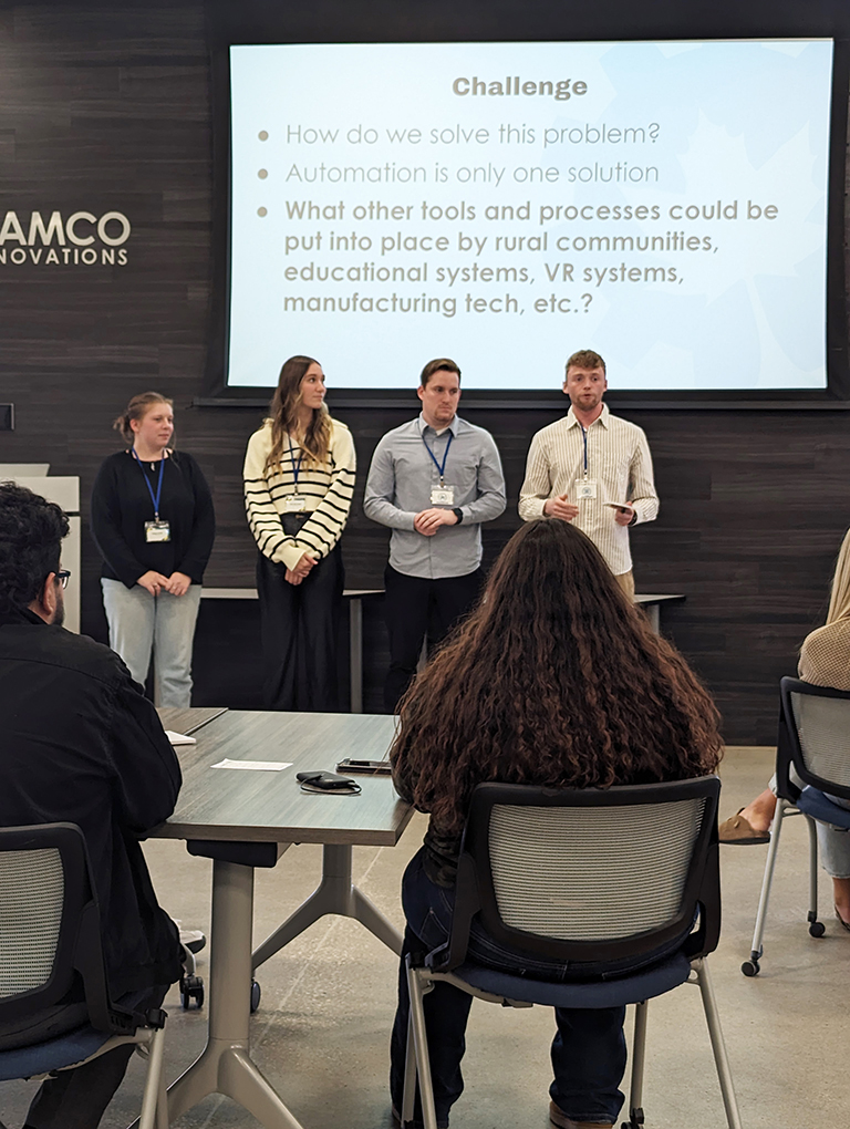 Students participate in a design challenge led by Hank Norem, CEO of Sukup Innovations, at Maple Studios in West Des Moines