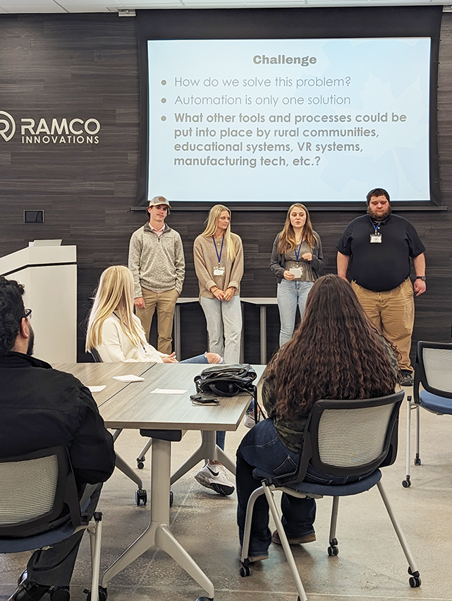 Students participate in a design challenge led by Hank Norem, CEO of Sukup Innovations, at Maple Studios in West Des Moines