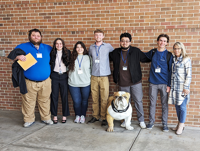 NIACC CEO Club students and NIACC Pappajohn Center Director Candi Karsjens 