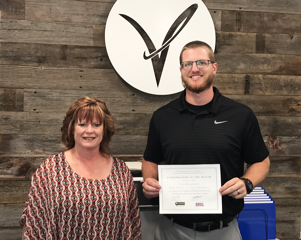 Dr. Brady Wilson of Victory Chiropractic and Jill Kramer of Hancock County Economic Development