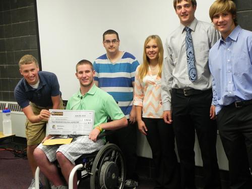 YEA Students make donation to Sci-Can