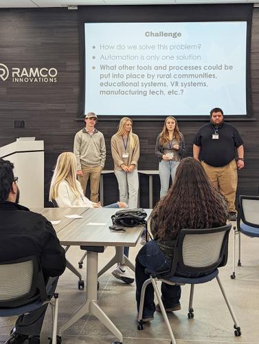 Students participate in a design challenge led by Hank Norem, CEO of Sukup Innovations, at Maple Studios in West Des Moines