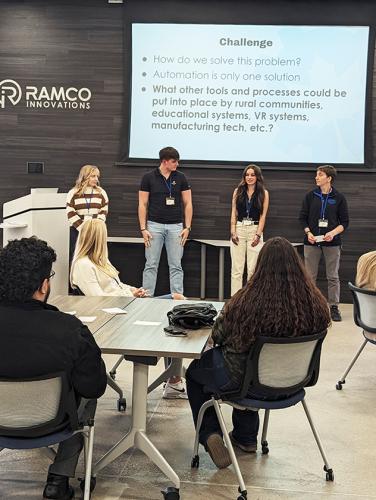 Students participate in a design challenge led by Hank Norem, CEO of Sukup Innovations, at Maple Studios in West Des Moines