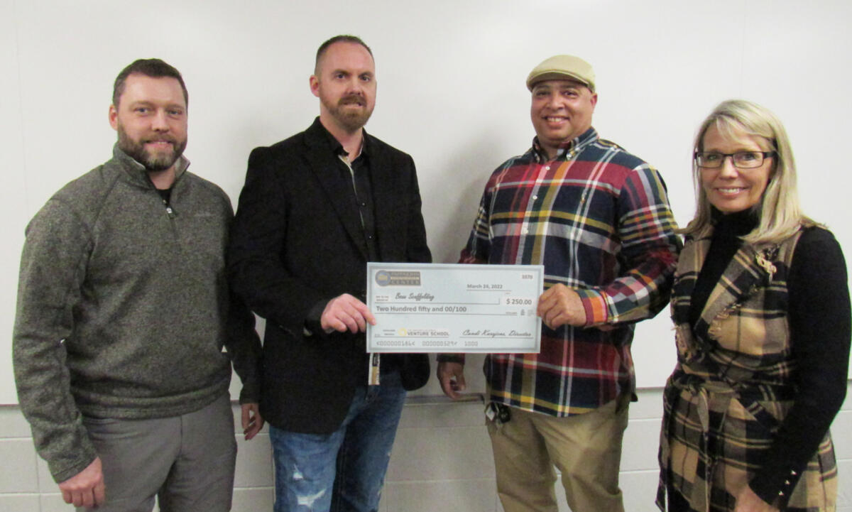 Grant Maulsby and Stanley Woolery with Venture School judge Jeff Potts and Pappajohn Center Director Candi Karsjens